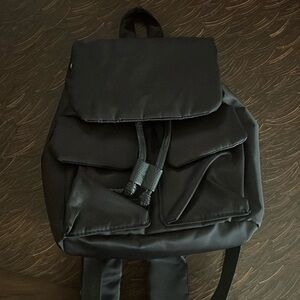 Forever 21 mini black backpack. Lots of pockets for storage